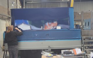 Stages of the boat building for CanalAbility's new accessible electric canal boat June 2026