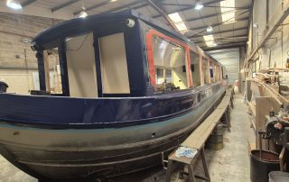 Stages of the boat building for CanalAbility's new accessible electric canal boat April 2026